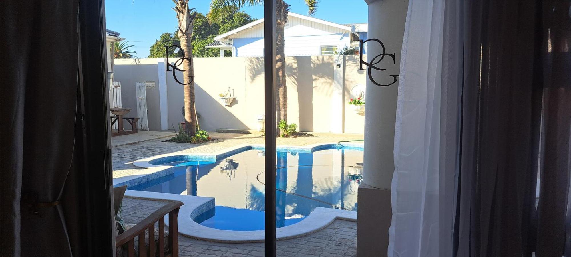 Raston Guest House แลมเบิร์ตส์เบย์ ห้อง รูปภาพ